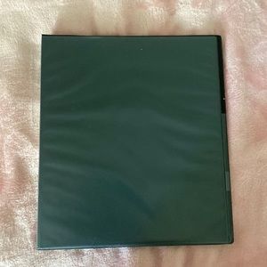 One black 3 ring binder with double pockets